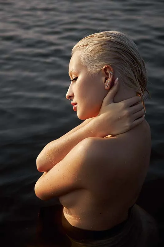 Naked woman in water