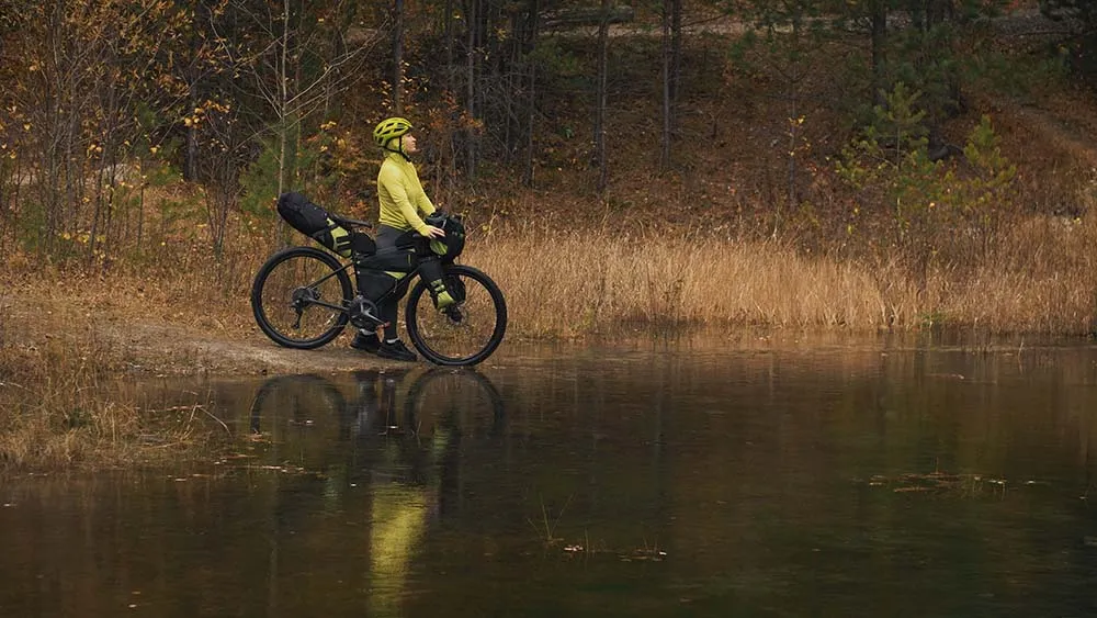 Riding a bicycle through a swamp