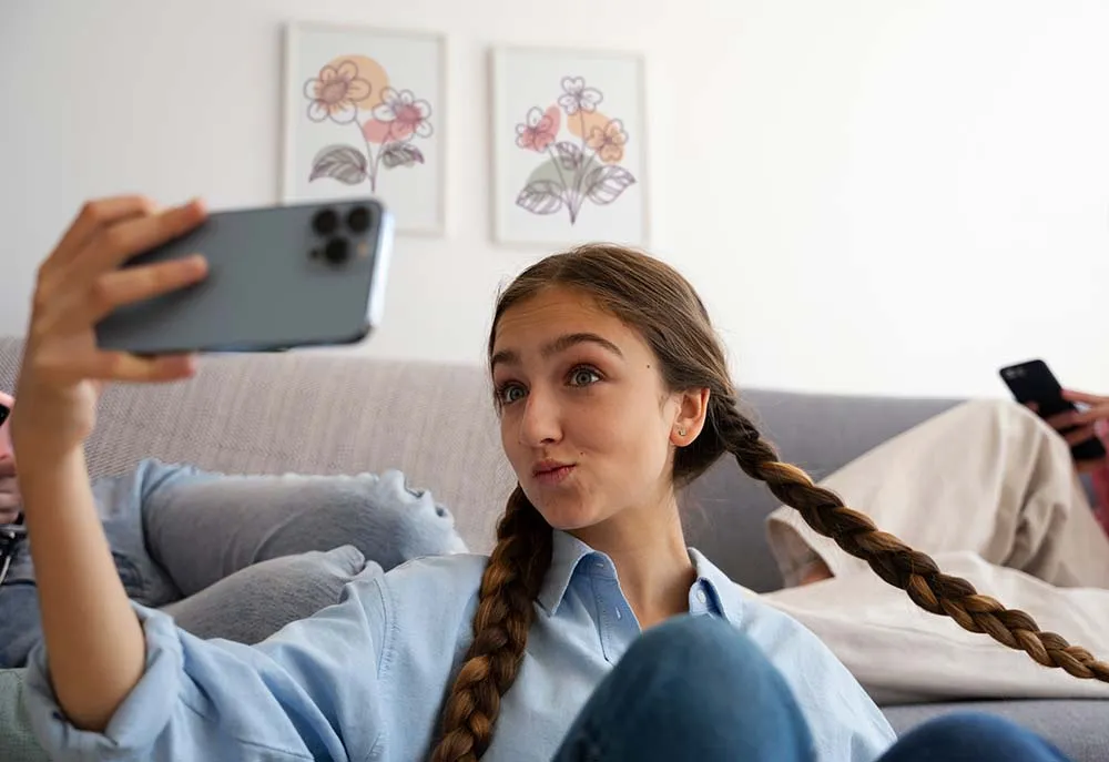 Indoor teen selfie